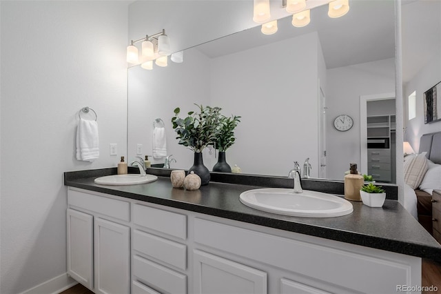13736 Umatilla Ln, Broomfield, CO 80023 - bathroom featuring double vanity