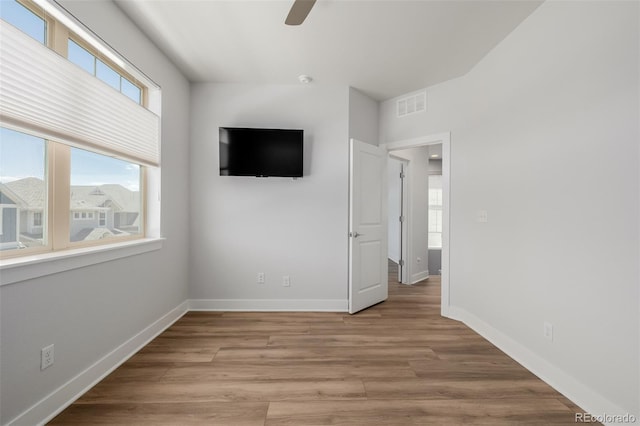 13736 Umatilla Ln, Broomfield, CO 80023 - unfurnished bedroom with light wood finished floors and a ceiling fan