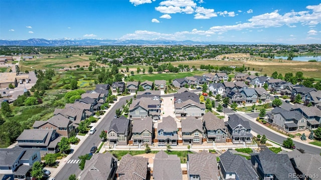 13736 Umatilla Ln, Broomfield, CO 80023 - aerial perspective of suburban area featuring a water and mountain view