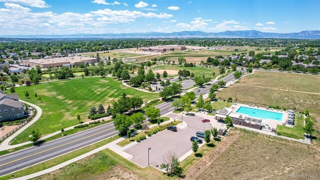 13736 Umatilla Ln, Broomfield, CO 80023 - aerial view of a pool and a mountainous background