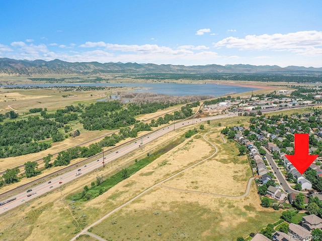3661 Seramonte Dr, Highlands Ranch, CO 80129 - bird's eye view of a water and mountain view and a main thoroughfare