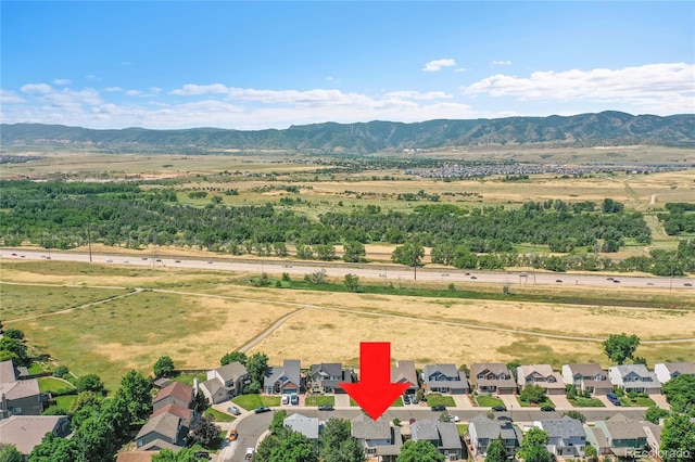 3661 Seramonte Dr, Highlands Ranch, CO 80129 - aerial perspective of suburban area with a mountain backdrop