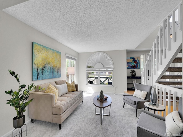 3661 Seramonte Dr, Highlands Ranch, CO 80129 - carpeted living room featuring a textured ceiling and stairs