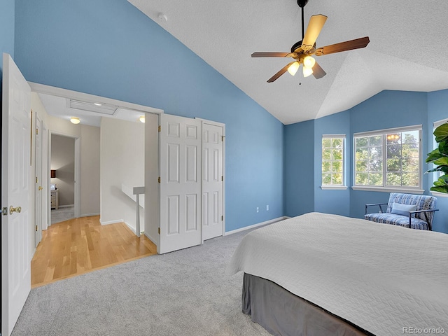 3661 Seramonte Dr, Highlands Ranch, CO 80129 - bedroom featuring carpet floors, vaulted ceiling, a textured ceiling, and ceiling fan