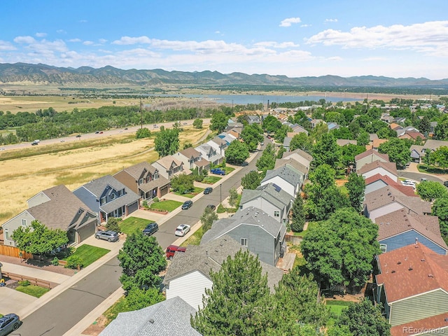 3661 Seramonte Dr, Highlands Ranch, CO 80129 - aerial view of residential area featuring a water and mountain view