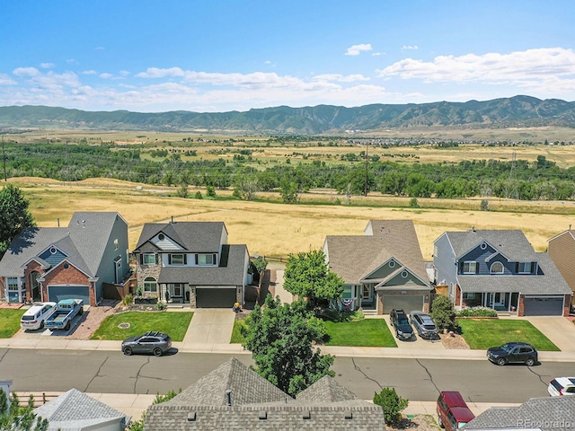 3661 Seramonte Dr, Highlands Ranch, CO 80129 - aerial perspective of suburban area featuring a mountain backdrop