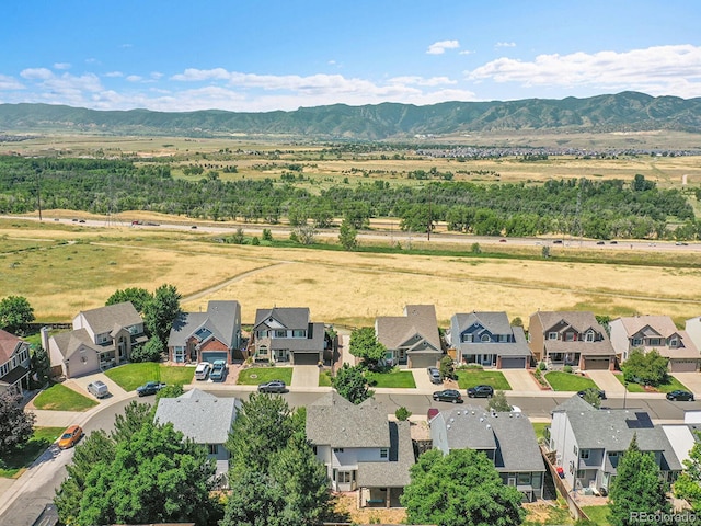 3661 Seramonte Dr, Highlands Ranch, CO 80129 - aerial perspective of suburban area with a mountain backdrop