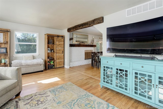5332 W Roxbury Pl, Littleton, CO 80128 - living room featuring light wood-style floors