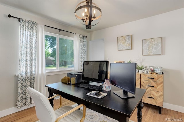 5332 W Roxbury Pl, Littleton, CO 80128 - office area with baseboards, wood finished floors, and a chandelier