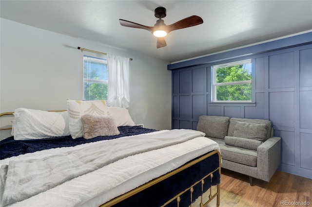 5332 W Roxbury Pl, Littleton, CO 80128 - bedroom with light wood-style flooring and ceiling fan