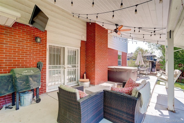 5332 W Roxbury Pl, Littleton, CO 80128 - view of patio / terrace with a hot tub, ceiling fan, and grilling area