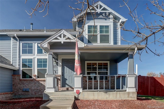 view of front of property featuring covered porch