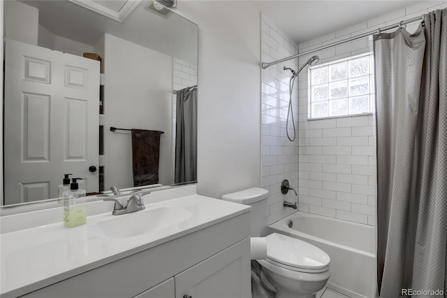 full bathroom featuring vanity, toilet, and shower / bath combo