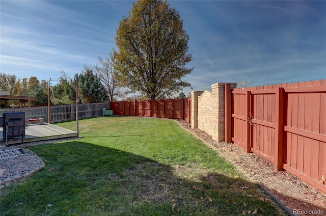 view of yard featuring a deck