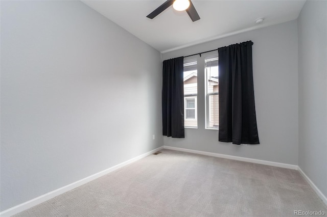 15443 W 65th Ave Unit B, Arvada, CO 80007 - unfurnished room featuring light colored carpet, ceiling fan, a smoke detector, and vaulted ceiling
