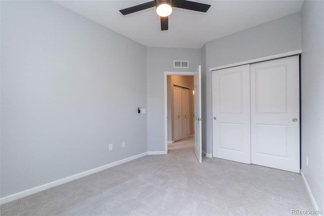 15443 W 65th Ave Unit B, Arvada, CO 80007 - unfurnished bedroom with light colored carpet, a closet, and ceiling fan
