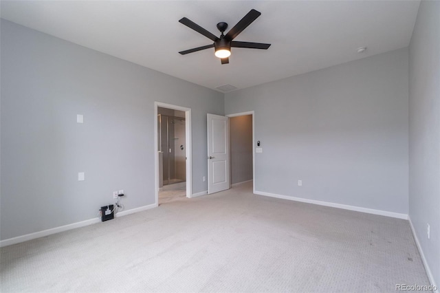 15443 W 65th Ave Unit B, Arvada, CO 80007 - unfurnished bedroom with light colored carpet, connected bathroom, and a ceiling fan