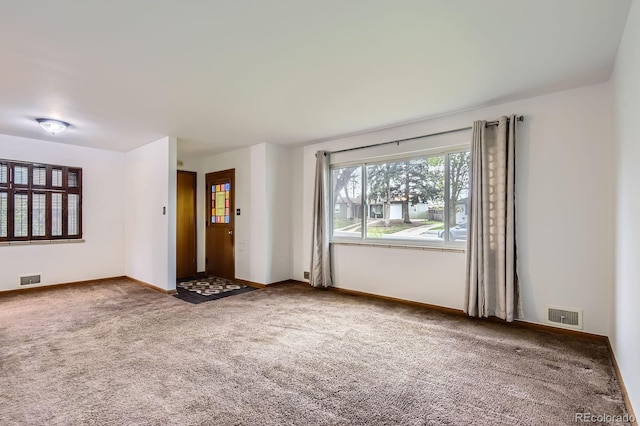 5370 S Sherman St, Littleton, CO 80121 - unfurnished living room with baseboards and carpet