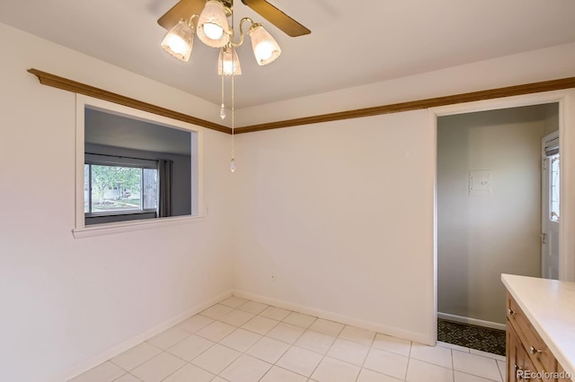 5370 S Sherman St, Littleton, CO 80121 - empty room featuring a ceiling fan, baseboards, and light tile patterned floors