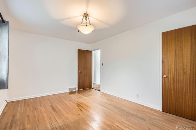 5370 S Sherman St, Littleton, CO 80121 - empty room with light wood-type flooring and baseboards