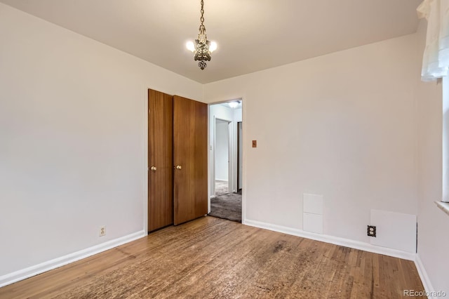 5370 S Sherman St, Littleton, CO 80121 - spare room featuring wood finished floors and baseboards