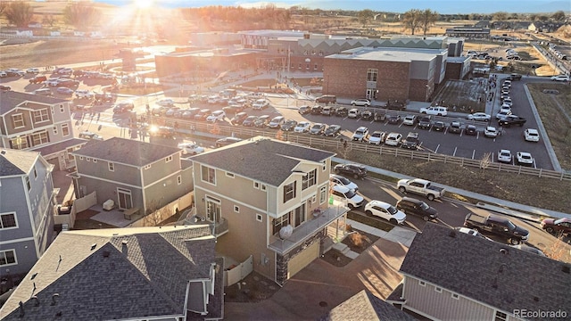 birds eye view of property with a residential view