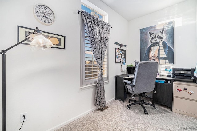 office space with light colored carpet and baseboards