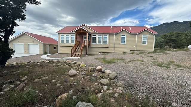 view of front of house with a mountain view