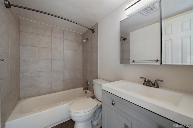 full bathroom with a textured ceiling, toilet, vanity, visible vents, and tub / shower combination