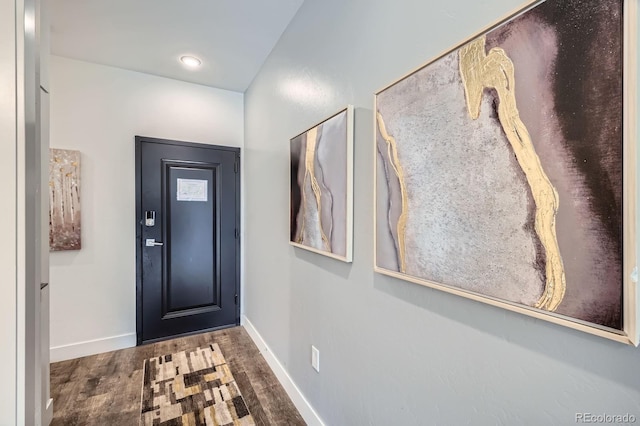 930 Blue River Pkwy Unit 812, Silverthorne, CO 80498 - entryway featuring baseboards and wood finished floors
