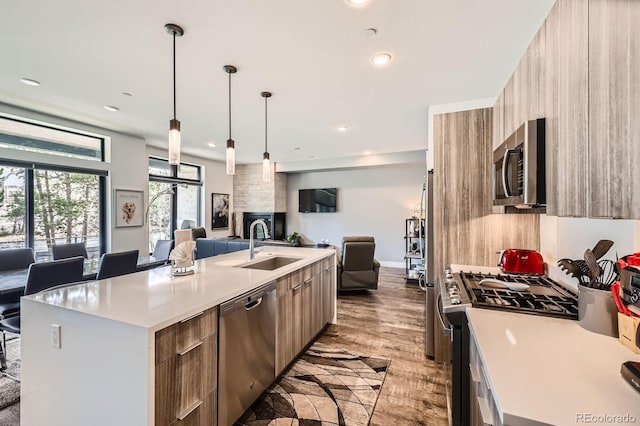 930 Blue River Pkwy Unit 812, Silverthorne, CO 80498 - kitchen with open floor plan, modern cabinets, a large island, and stainless steel appliances
