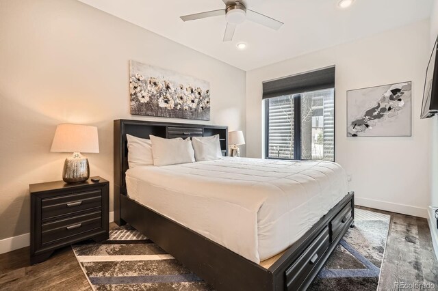 930 Blue River Pkwy Unit 812, Silverthorne, CO 80498 - bedroom featuring recessed lighting, baseboards, a ceiling fan, and dark wood-type flooring