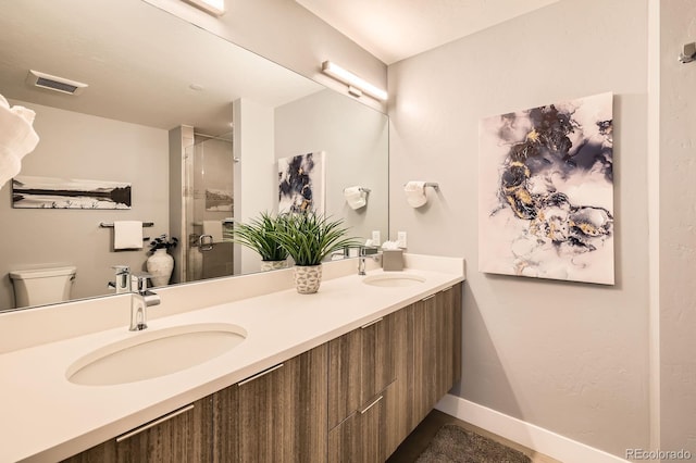 930 Blue River Pkwy Unit 812, Silverthorne, CO 80498 - bathroom featuring a sink, a stall shower, double vanity, and visible vents