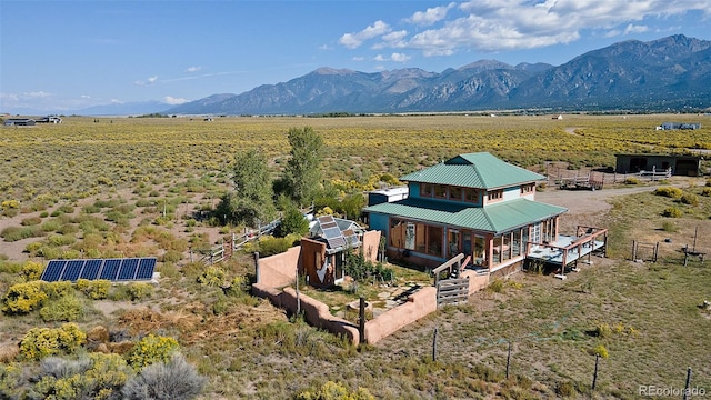 bird's eye view featuring a mountain view and a rural view