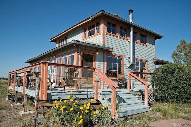 view of front of property with a deck