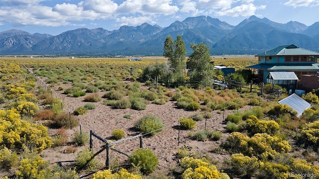 mountain view featuring a rural view