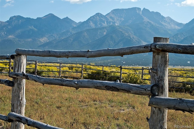 view of mountain feature with a rural view