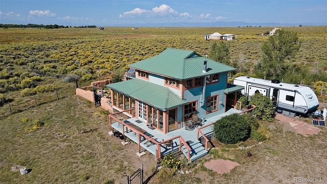 birds eye view of property featuring a rural view