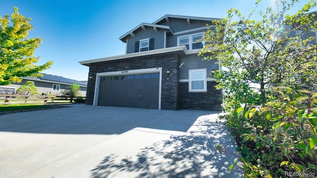 craftsman-style home featuring a garage