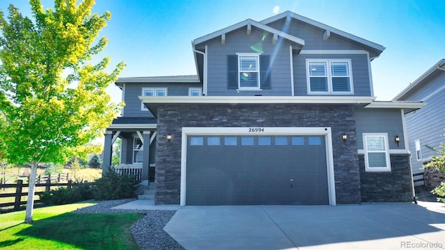 craftsman-style home featuring a garage