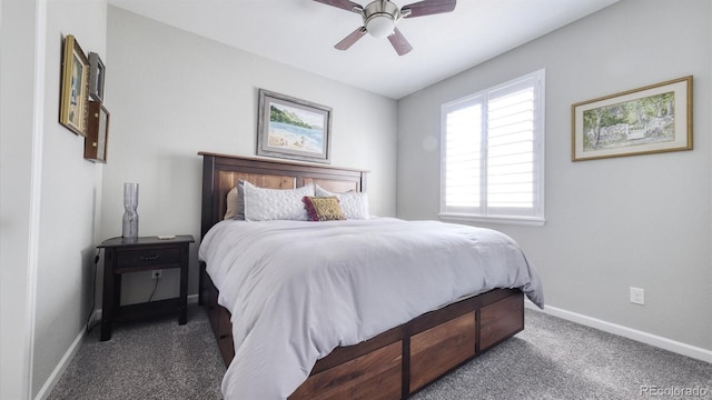 bedroom with ceiling fan and dark carpet