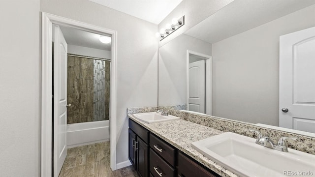 bathroom featuring vanity and shower / bathtub combination