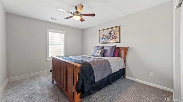 bedroom featuring ceiling fan and carpet