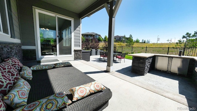 view of patio / terrace featuring area for grilling and an outdoor living space