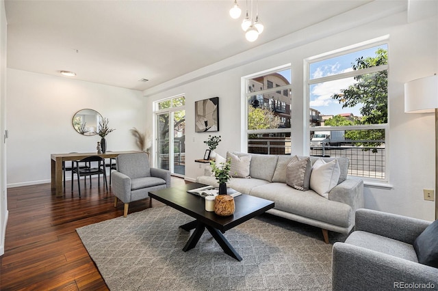 10184 Park Meadows Dr Unit 1102, Lone Tree, CO 80124 - living area with wood finished floors and baseboards