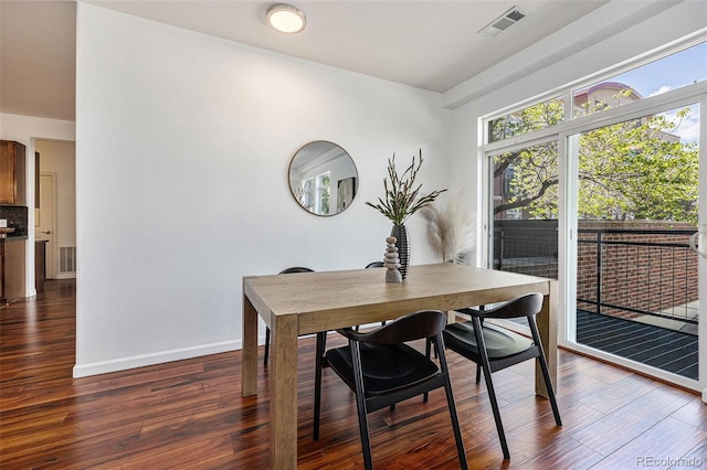 10184 Park Meadows Dr Unit 1102, Lone Tree, CO 80124 - dining space with dark wood-style flooring and baseboards