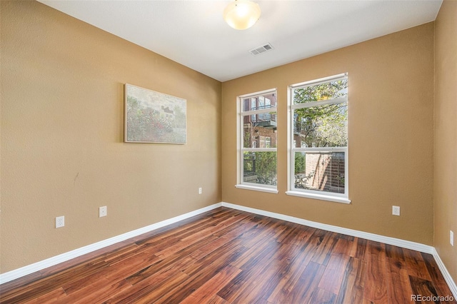 10184 Park Meadows Dr Unit 1102, Lone Tree, CO 80124 - empty room featuring dark wood-style floors and baseboards