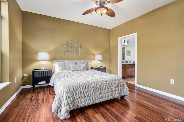 10184 Park Meadows Dr Unit 1102, Lone Tree, CO 80124 - bedroom featuring wood finished floors, baseboards, connected bathroom, a ceiling fan, and a sink