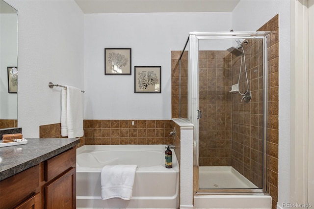 10184 Park Meadows Dr Unit 1102, Lone Tree, CO 80124 - full bathroom featuring a bath, a stall shower, and vanity