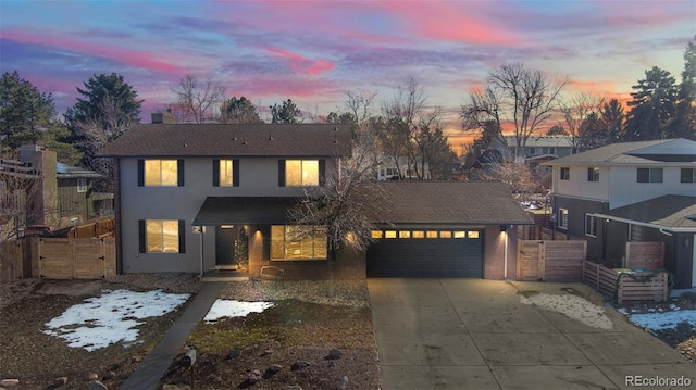 view of front of property featuring a garage